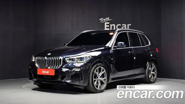 BMW X5 2021 — Фото 1/20