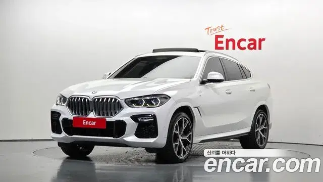 BMW X6 2021 — Фото 1/20