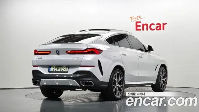 BMW X6 2021 — Фото 2/20