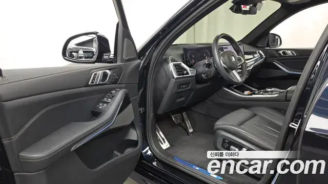 BMW X5 2023 — ფოტო 24/32