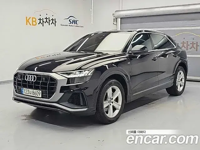 Audi Q7 2021 — Photo 1/19