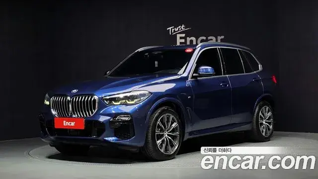 BMW X5 2019 — Фото 1/20