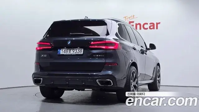 BMW X5 2022 — Фото 1/20