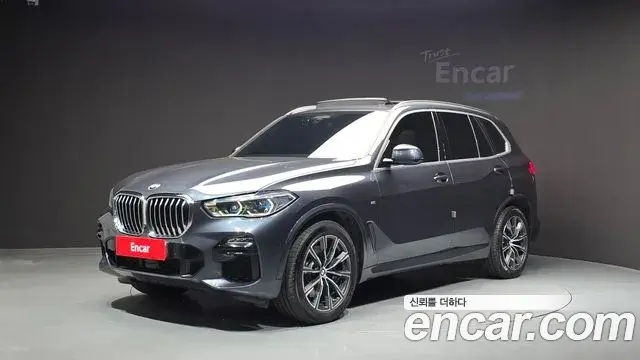 BMW X5 2021 — Фото 1/20