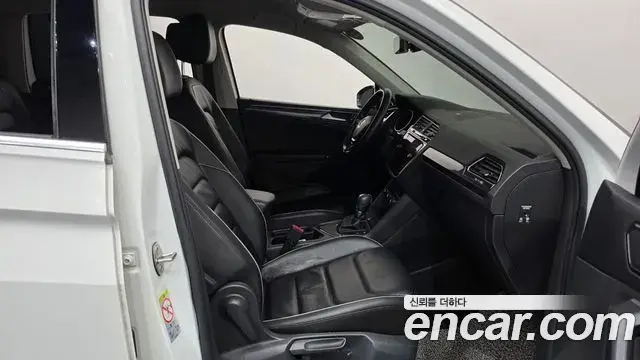 Volkswagen Tiguan 2018 — ფოტო 4/36