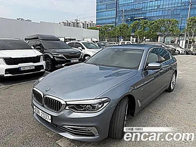 BMW 5 Series 2018 — ფოტო 4/20