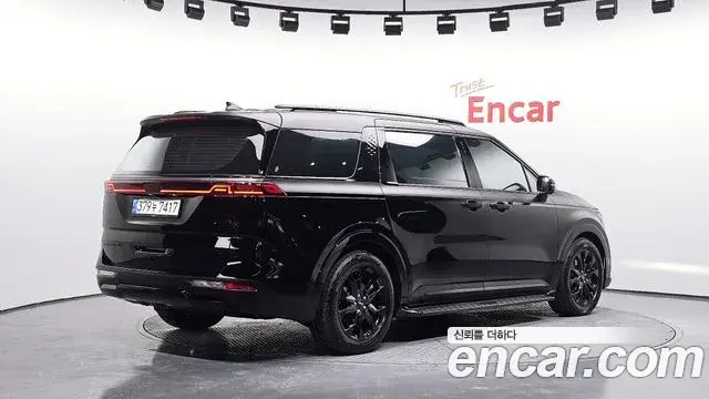 Kia Carnival 2021 — ფოტო 7/20