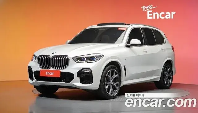 BMW X5 2021 — Фото 1/20