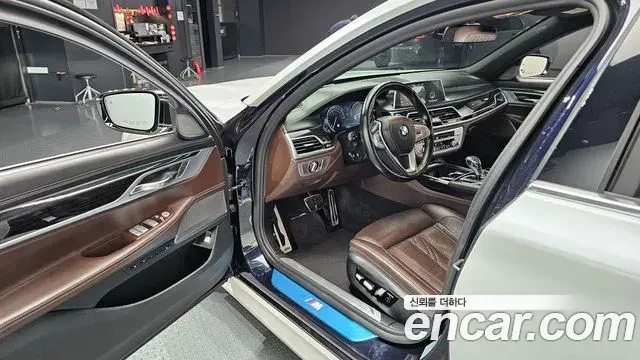 BMW 7 Series 2018 — Фото 10/20