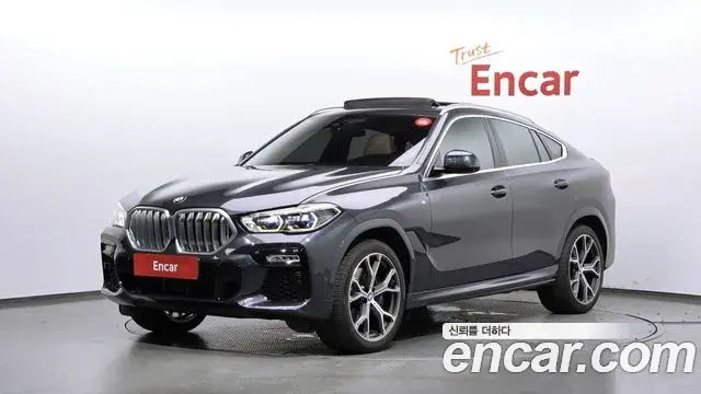 BMW X6 2021 — Фото 1/20