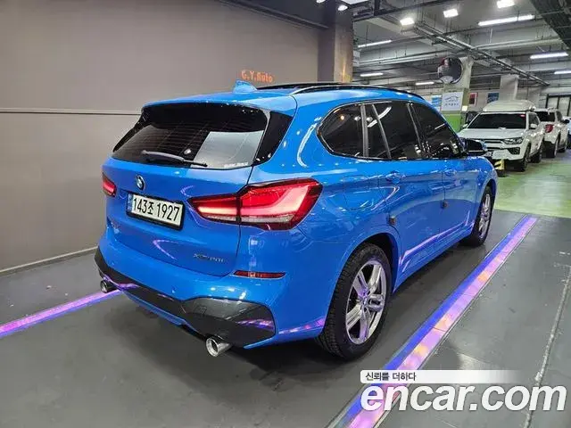 BMW X1 2021 — Фото 2/20
