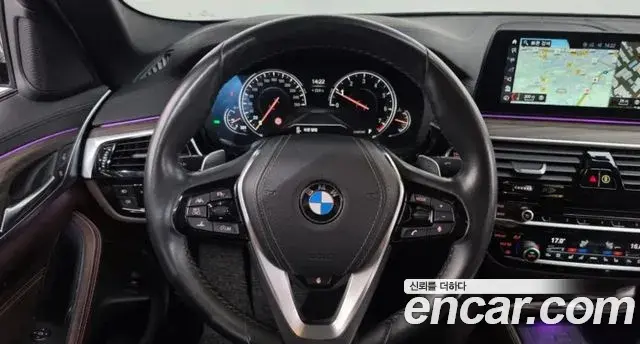 BMW 5 Series 2018 — Фото 11/20
