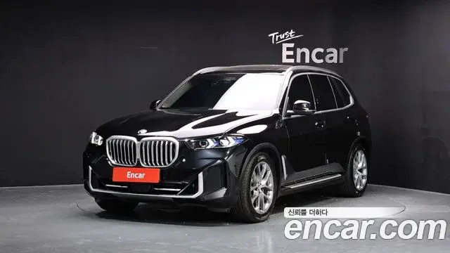 BMW X5 2024 — Photo 1/20