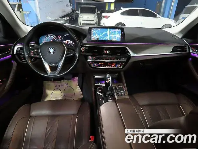 BMW 5 Series 2018 — Фото 9/20