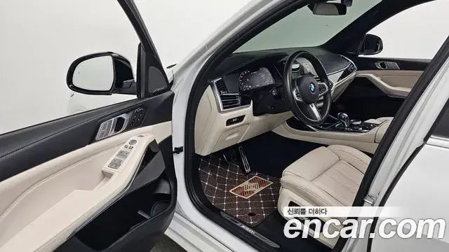 BMW X7 2022 — Фото 10/20
