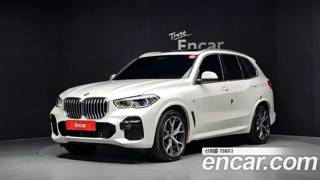 BMW X5 2022 — Фото 1/20