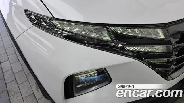 Hyundai Tucson Hybrid 2023 — Photo 2/34