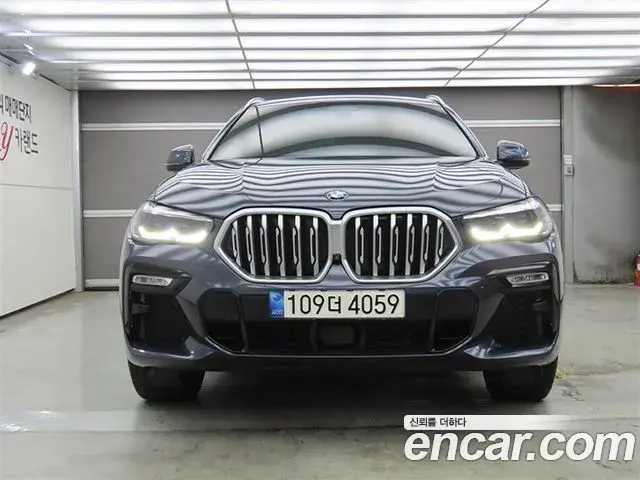 BMW X6 2021 — Фото 1/19