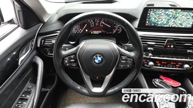 BMW 5 Series 2018 — Фото 13/20