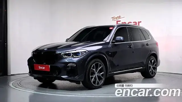 BMW X5 2021 — Фото 1/20