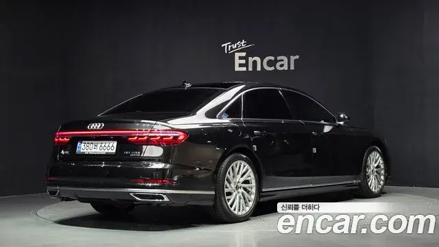 Audi A8 2021 — Фото 2/20