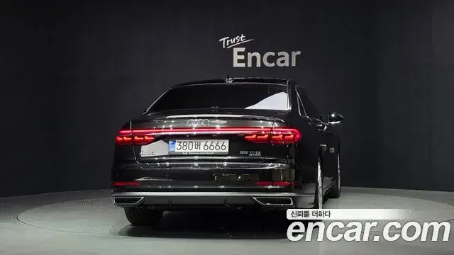 Audi A8 2021 — Фото 4/20