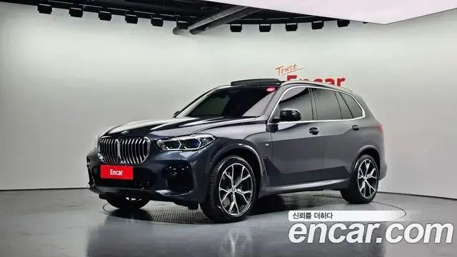 BMW X5 2022 — Фото 1/20