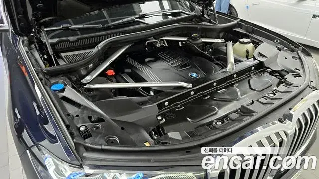 BMW X7 2021 — ფოტო 11/20