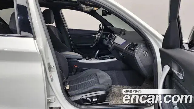 BMW 1 Series 2018 — ფოტო 19/20