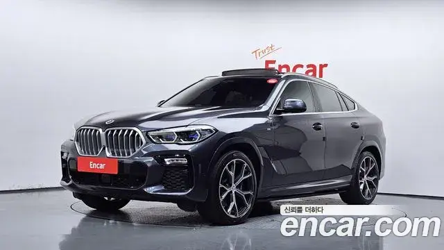 BMW X6 2021 — Фото 1/20