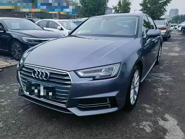 Audi A4L 2018 — Фото 1/17