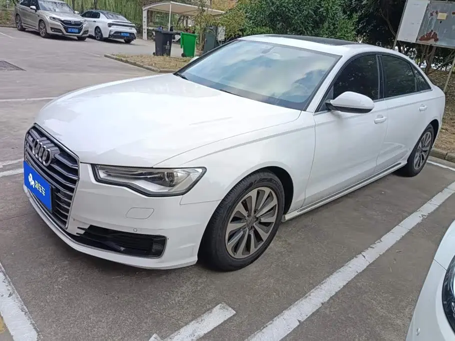 Audi A6L 2016 — Фото 1/16