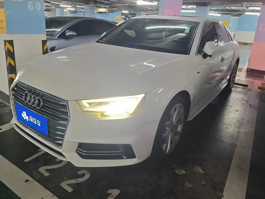 Audi A4L 2018 — Фото 1/16