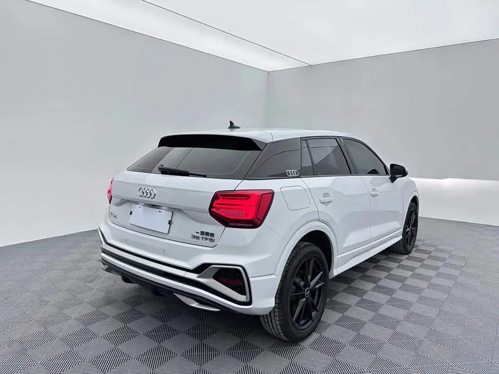 Audi Q2L 2023 — Фото 6/18
