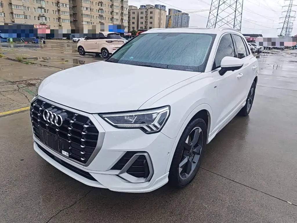 Audi Q3 2021 — ფოტო 1/20