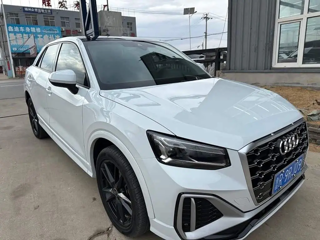Audi Q2L 2022 — Photo 1/16