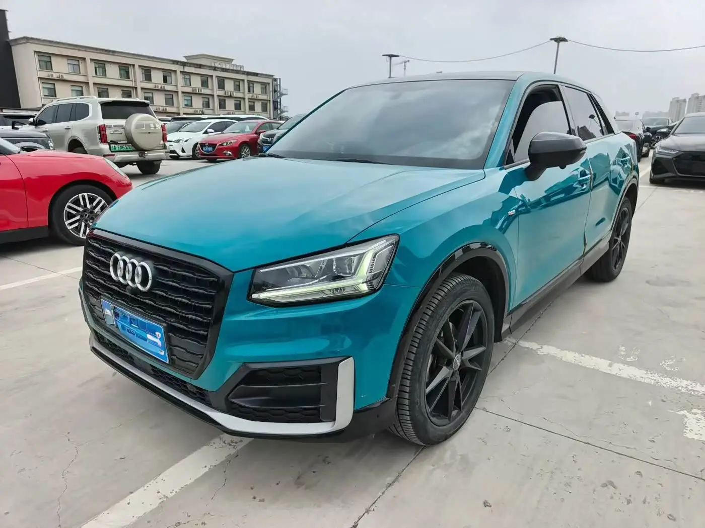 Audi Q2L 2021 — Фото 1/9