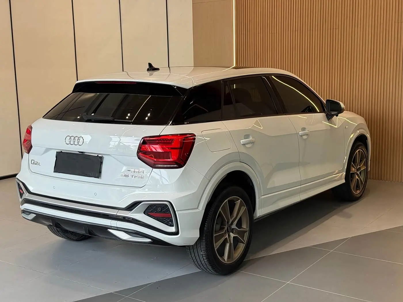 Audi Q2L 2023 — Photo 18/19