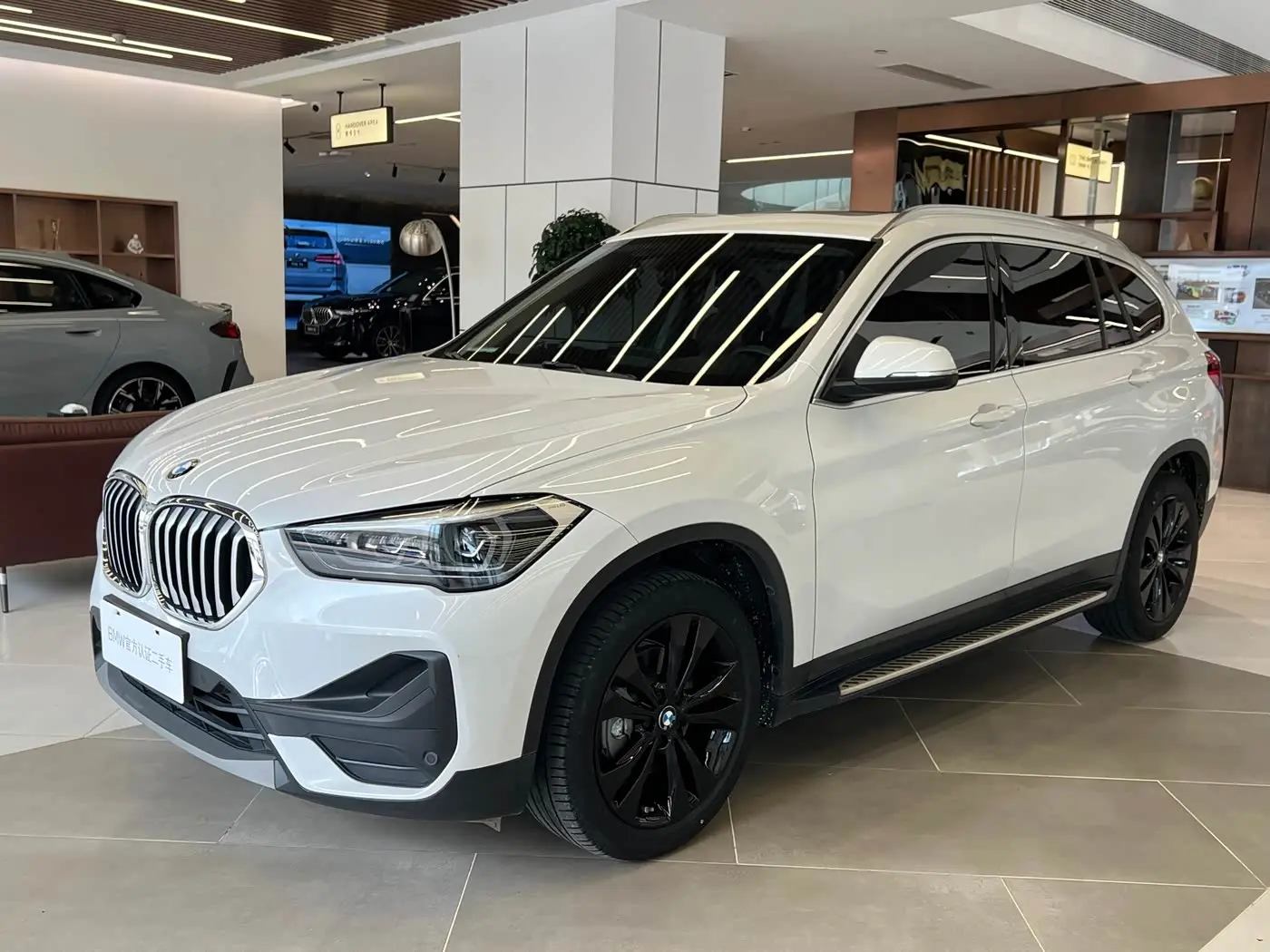 BMW X1 2021 — Фото 1/13