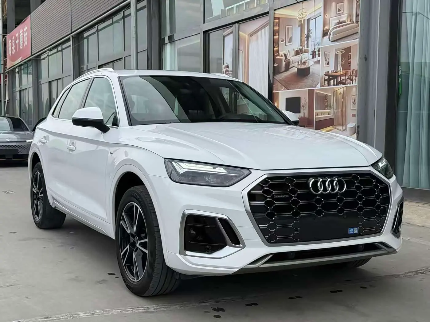 Audi Q5L 2024 — Photo 2/16