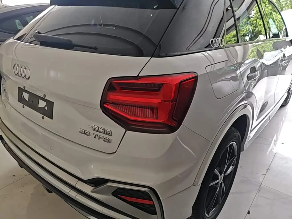 Audi Q2L 2023 — Фото 8/20