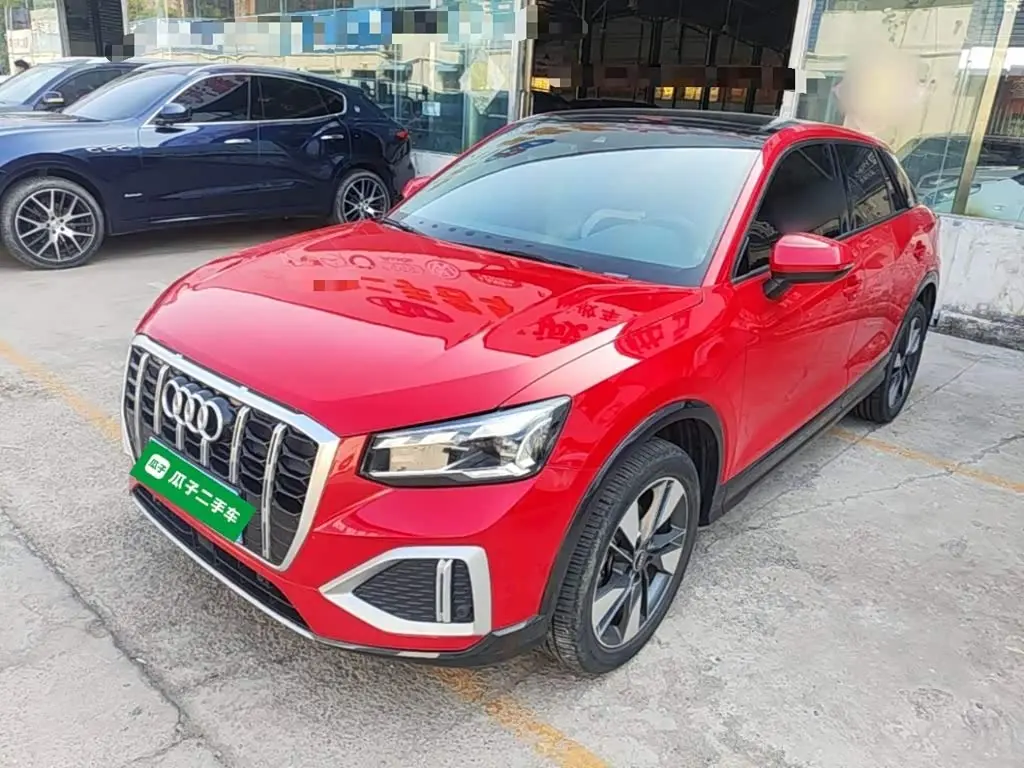 Audi Q2L 2022 — Photo 1/20