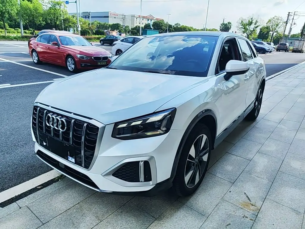Audi Q2L 2021 — Фото 1/20