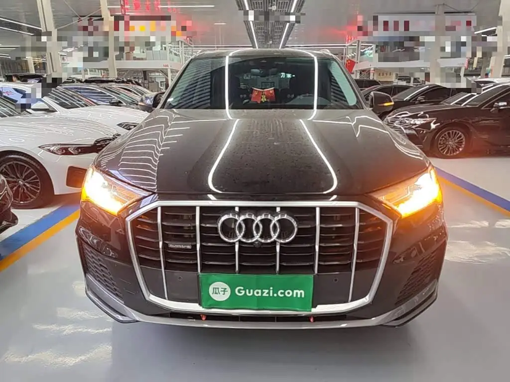 Audi Q7 2024 — Photo 2/19