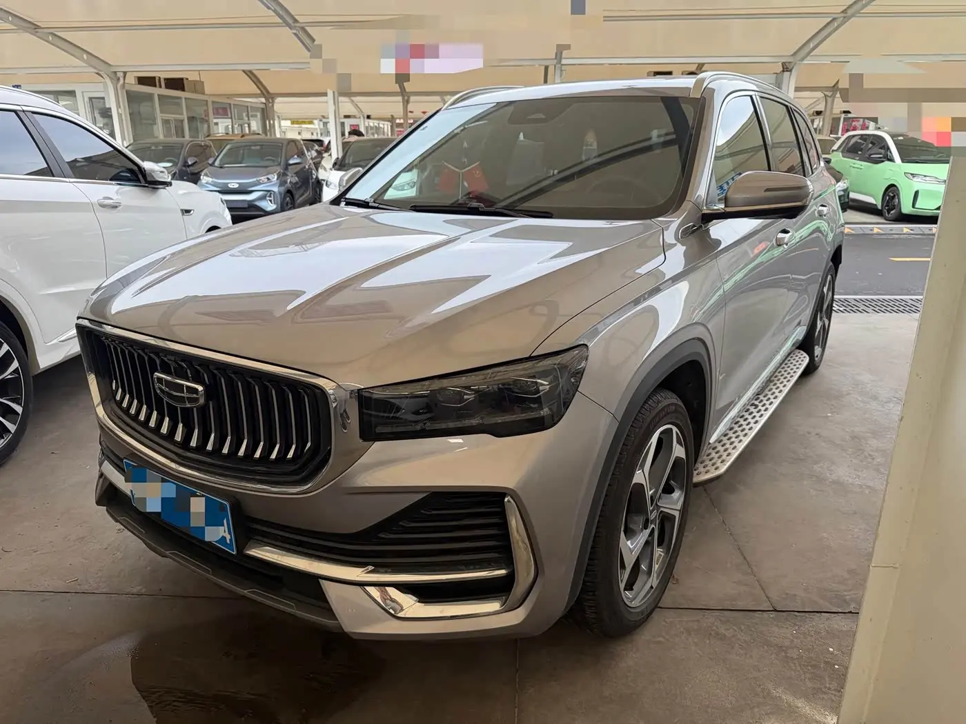 Geely Xingyue L 2024 — Фото 1/10