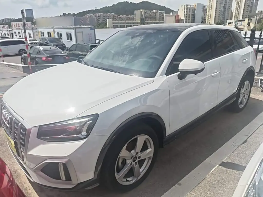 Audi Q2L 2022 — Photo 1/20