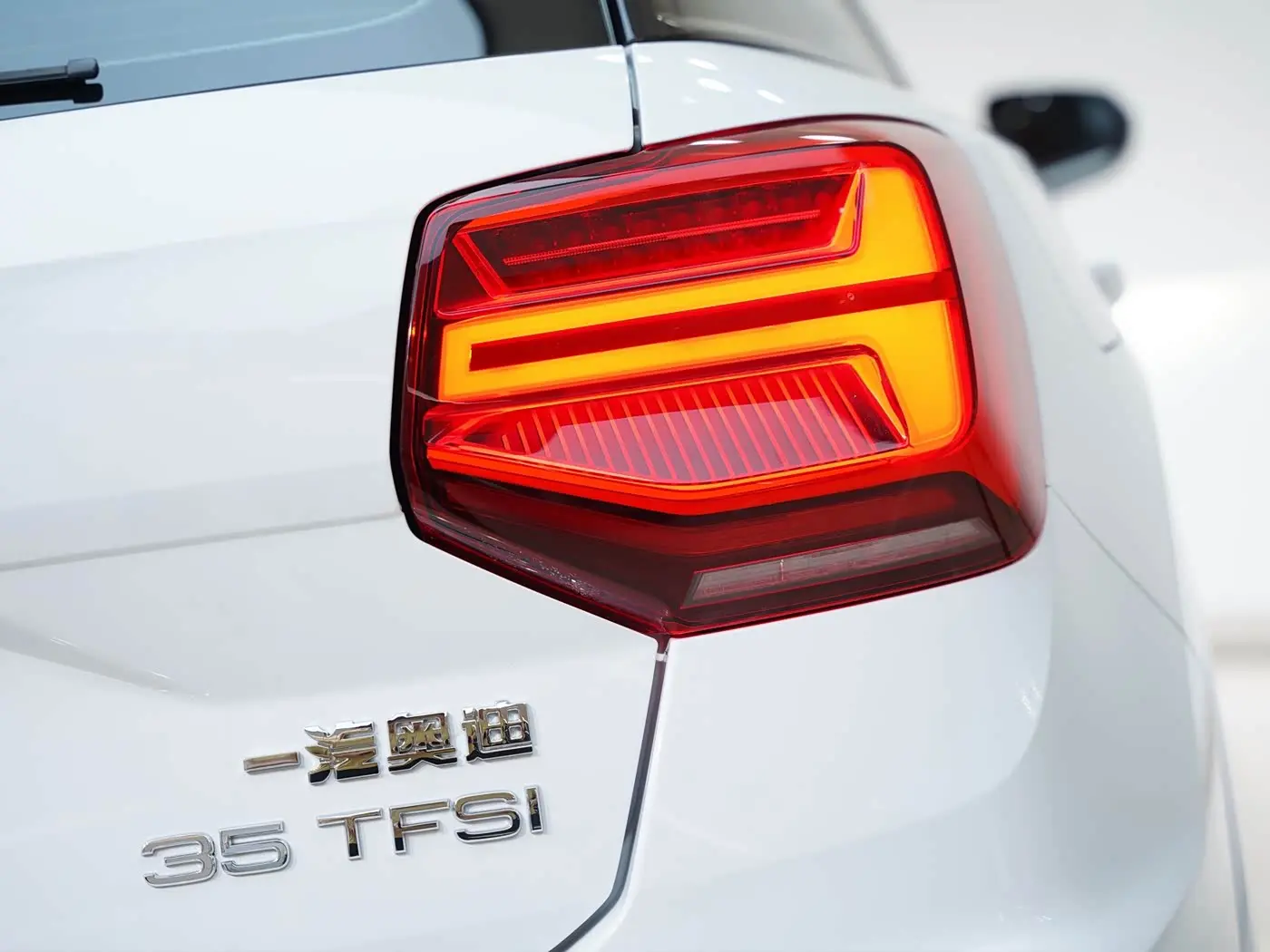 Audi Q2L 2021 — Фото 8/18