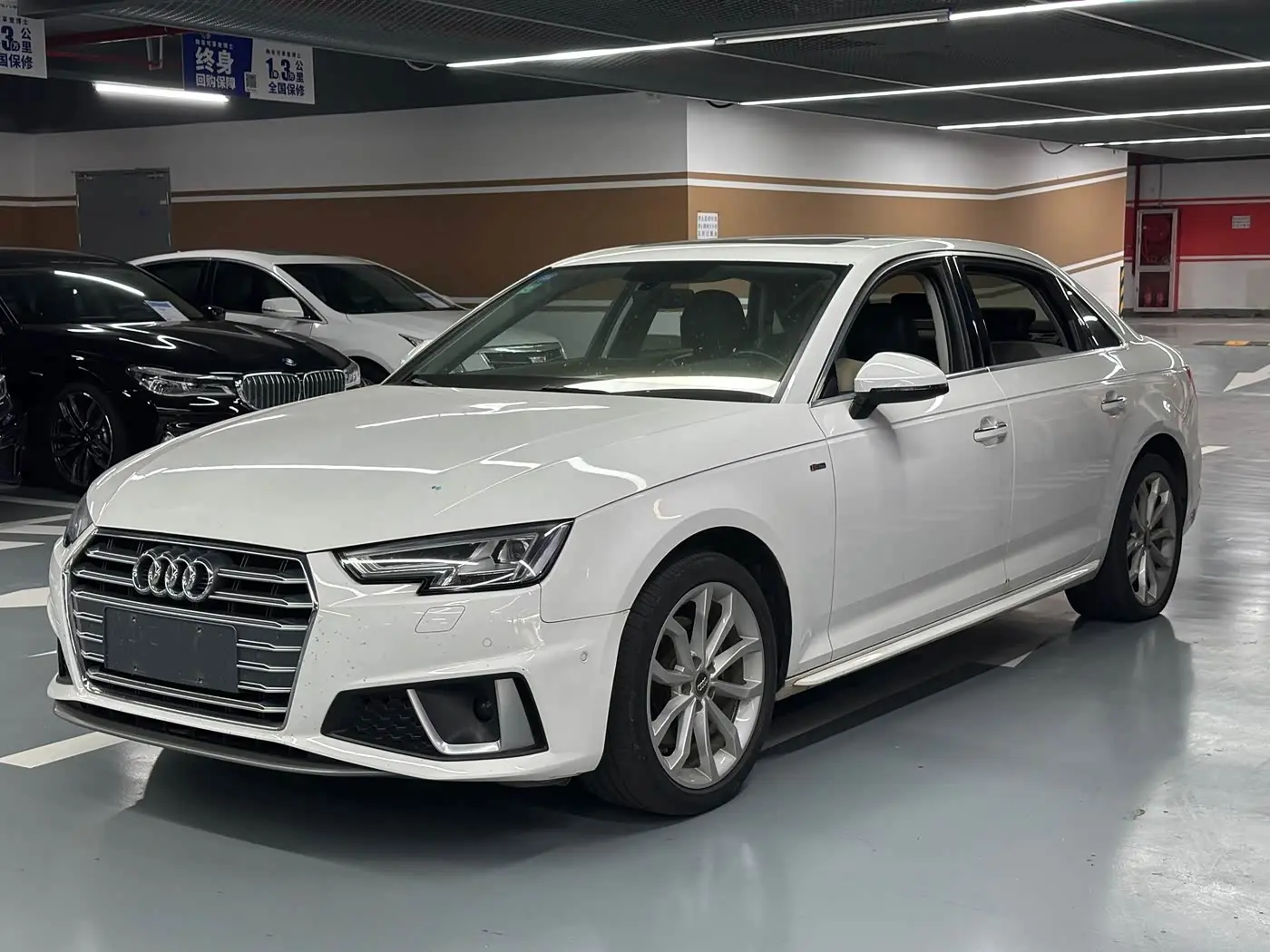 Audi A4L 2019 — Фото 1/13