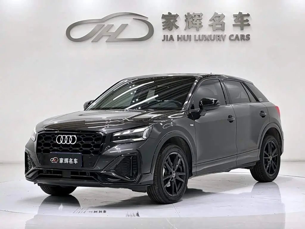 Audi Q2L 2023 — Photo 1/14
