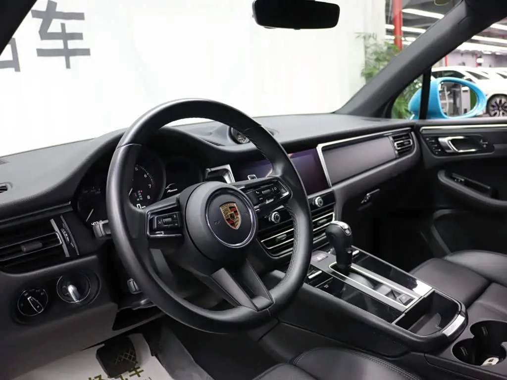 Porsche Macan 2023 — Фото 8/20